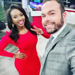 A photo of Robin Winston With Colleague 